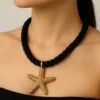 Collar estrella marina dorada negro eryna