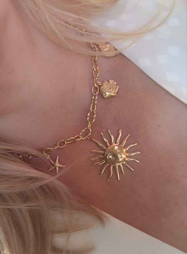 COLLAR ERYNA SOL Y CHAKRAS MARINOS ACERO DORADO
