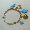 PULSERA ERYNA CHARMS MARINOS DORADO & COLOR