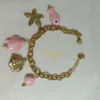 PULSERA ERYNA CHARMS MARINOS DORADO & COLOR