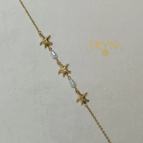 PULSERA DE ACERO DORADO CON ESTRELLAS DE MAR Y PERLAS