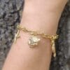 PULSERA ERYNA CHARMS MARINOS ACERO DORADO