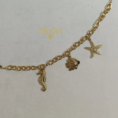 PULSERA ERYNA CHARMS MARINOS ACERO DORADO