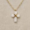 Colgante Cruz ERYNA en piedra blanca con cadena dorada de acero