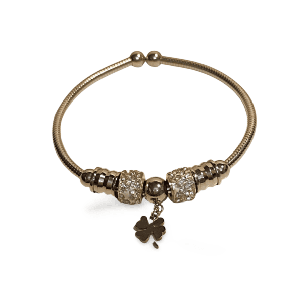 Pulsera rígida de acero inoxidable plateada con circonitas y charm de trébol