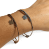 Pulsera ERYNA de acero inoxidable con trébol en plata y dorado