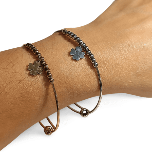 Pulsera ERYNA de acero inoxidable con trébol en plata y dorado