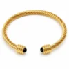 Pulsera rígida dorada ERYNA con piedras de colores - NEGRO