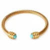 Pulsera rígida dorada ERYNA con piedras de colores - TURQUESA